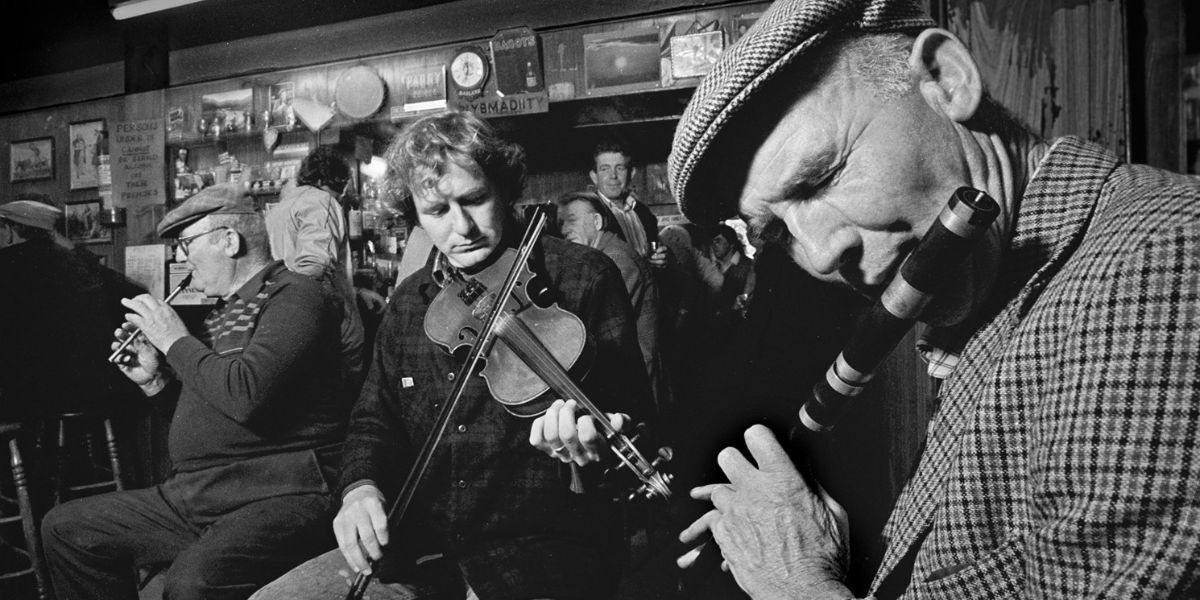 Gussie Russell playing with fiddle player - Photo by James Higgins